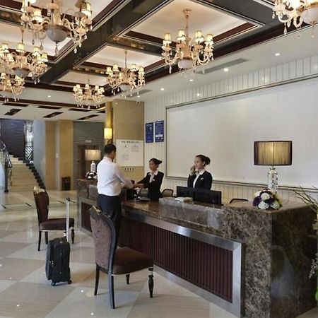 Wenhua Herton Hotel Qionghai Exterior photo